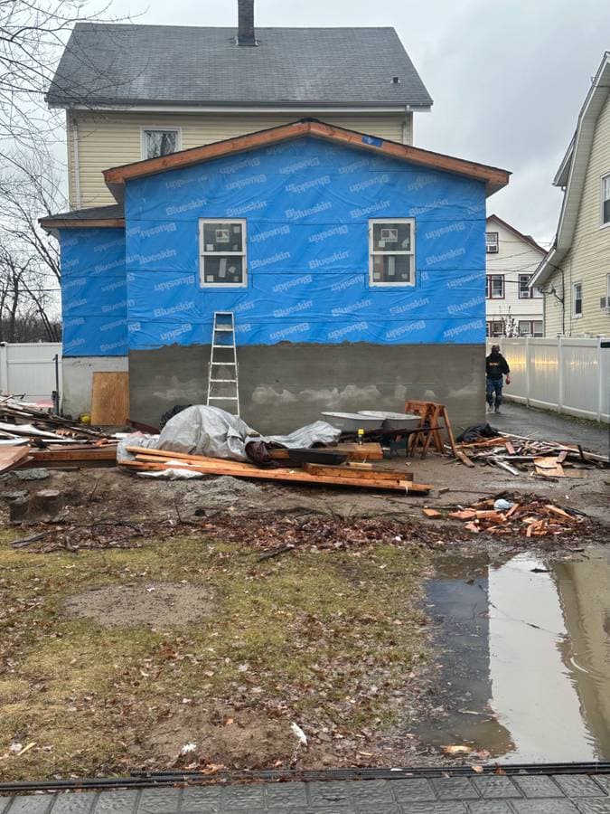 picture of an addition being built in long island new york by a construction and painting company